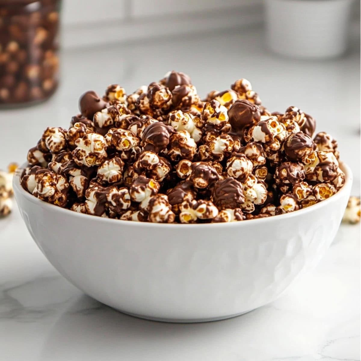 A bowl of sweet and salty chocolate covered popcorn.