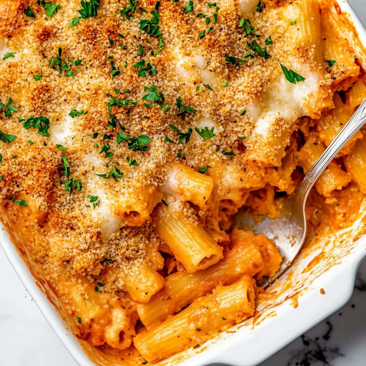 Copycat Olive Garden Five-Cheese Baked Ziti with crunchy breadcrumb topping, top view