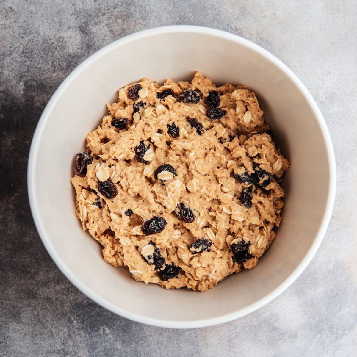 Vanishing Oatmeal Raisin Cookie Dough in a Bowl, top view - 3