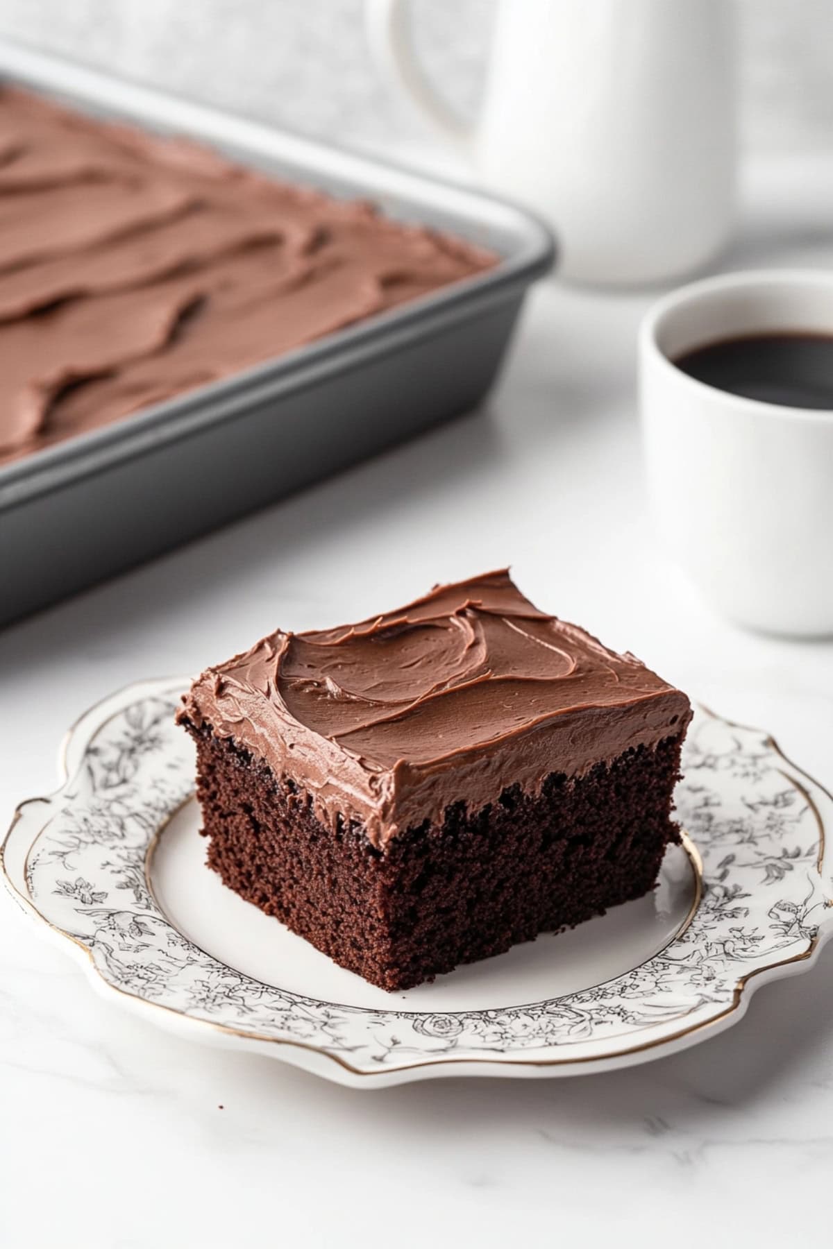 A decadent chocolate buttermilk cake with a generous layer of frosting at the top.