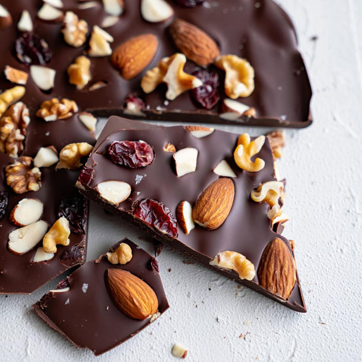 Chocolate bark with chopped almonds, walnuts and dried cranberries.
