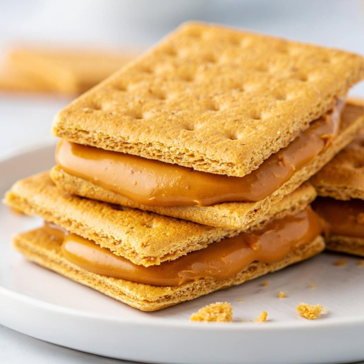 Graham cracker sandwiches filled with peanut butter.